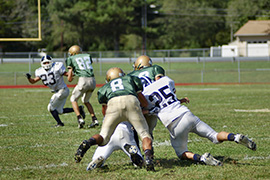 Teens Playing Football