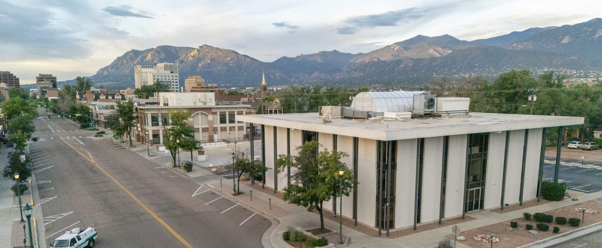 Downtown Colorado Springs buildings with the mountains behind