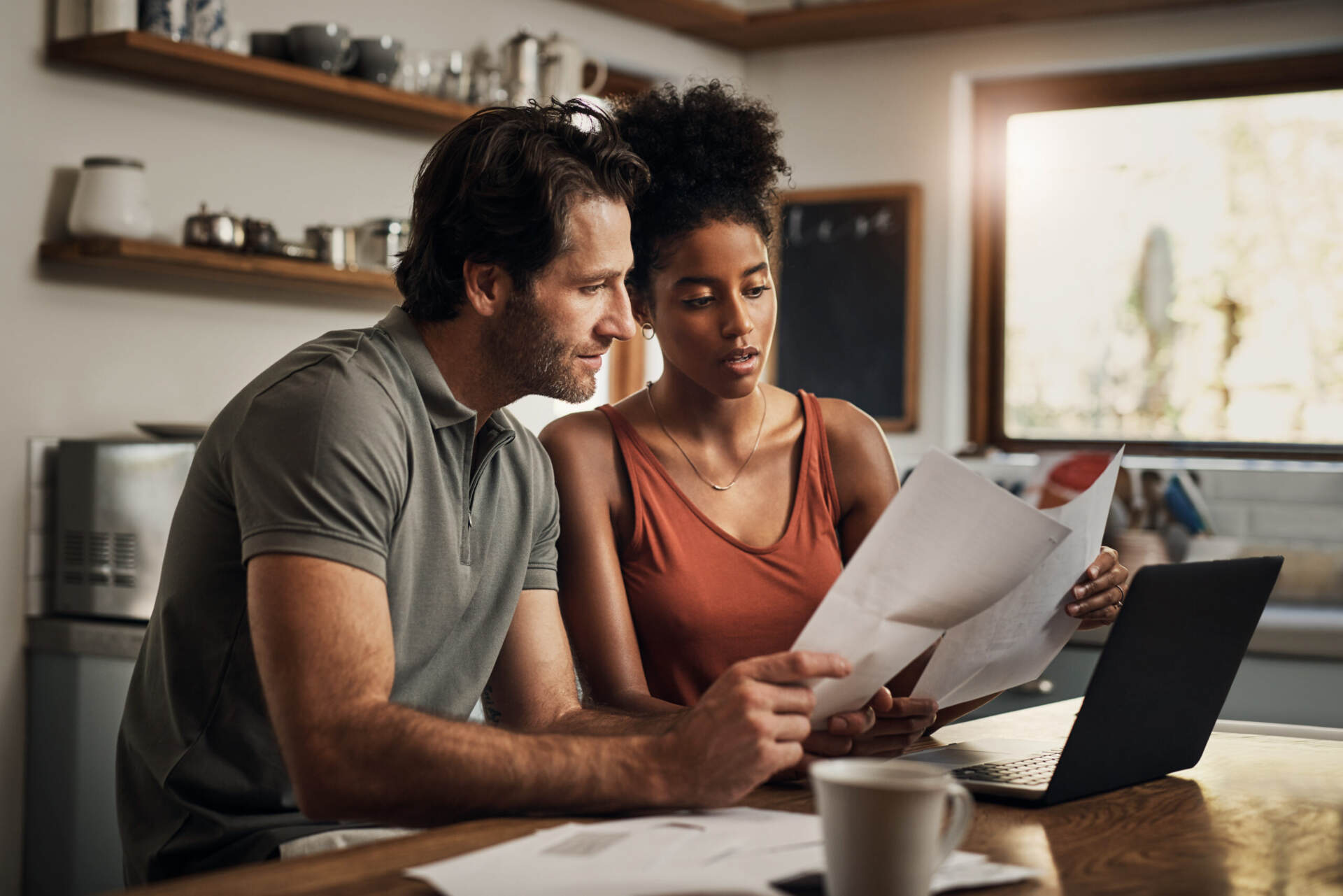 Reviewing paperwork for buying a home