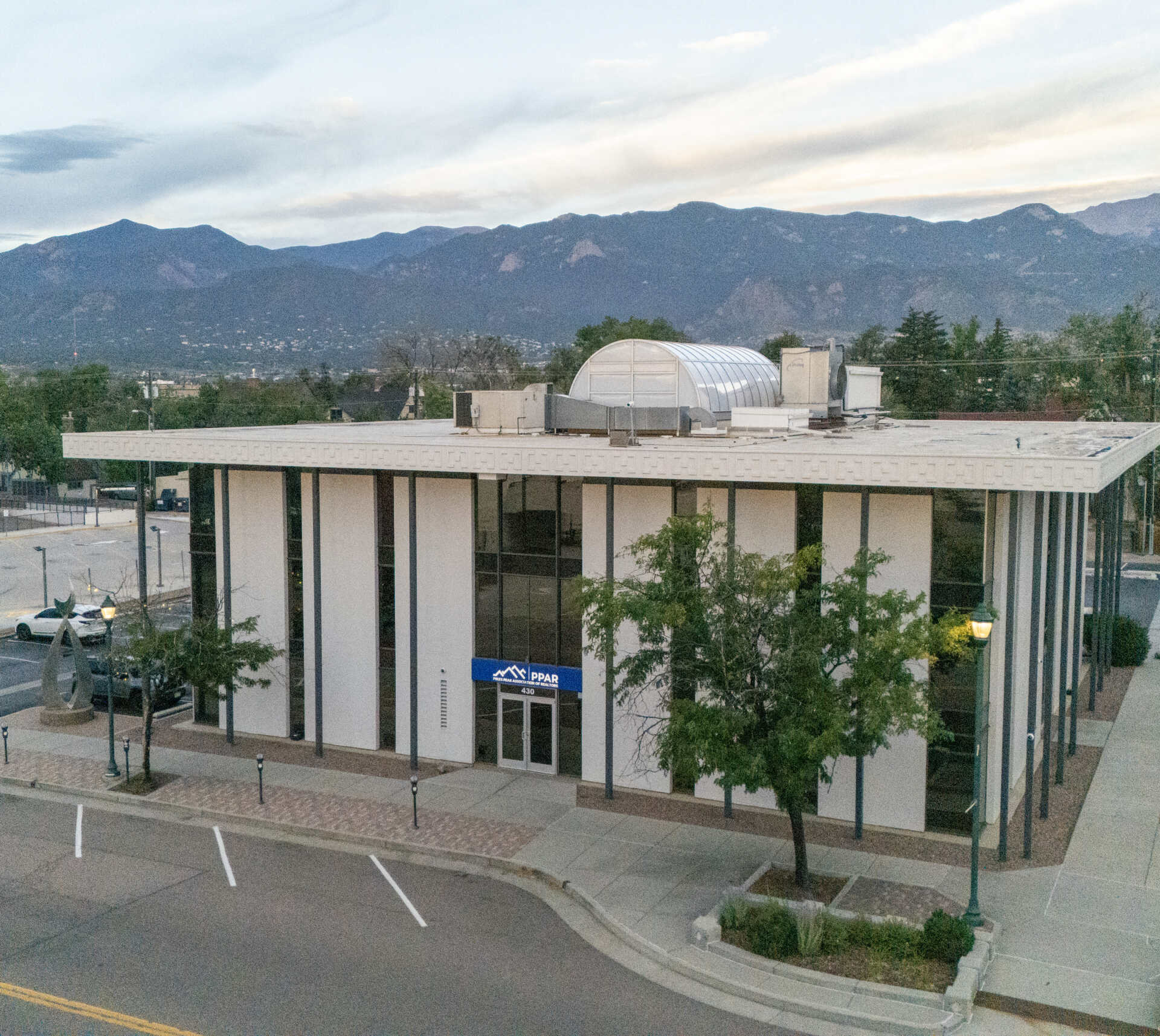 The PPAR office building at 430 N Tejon Street in Colorado Springs, with the Front Range behind it